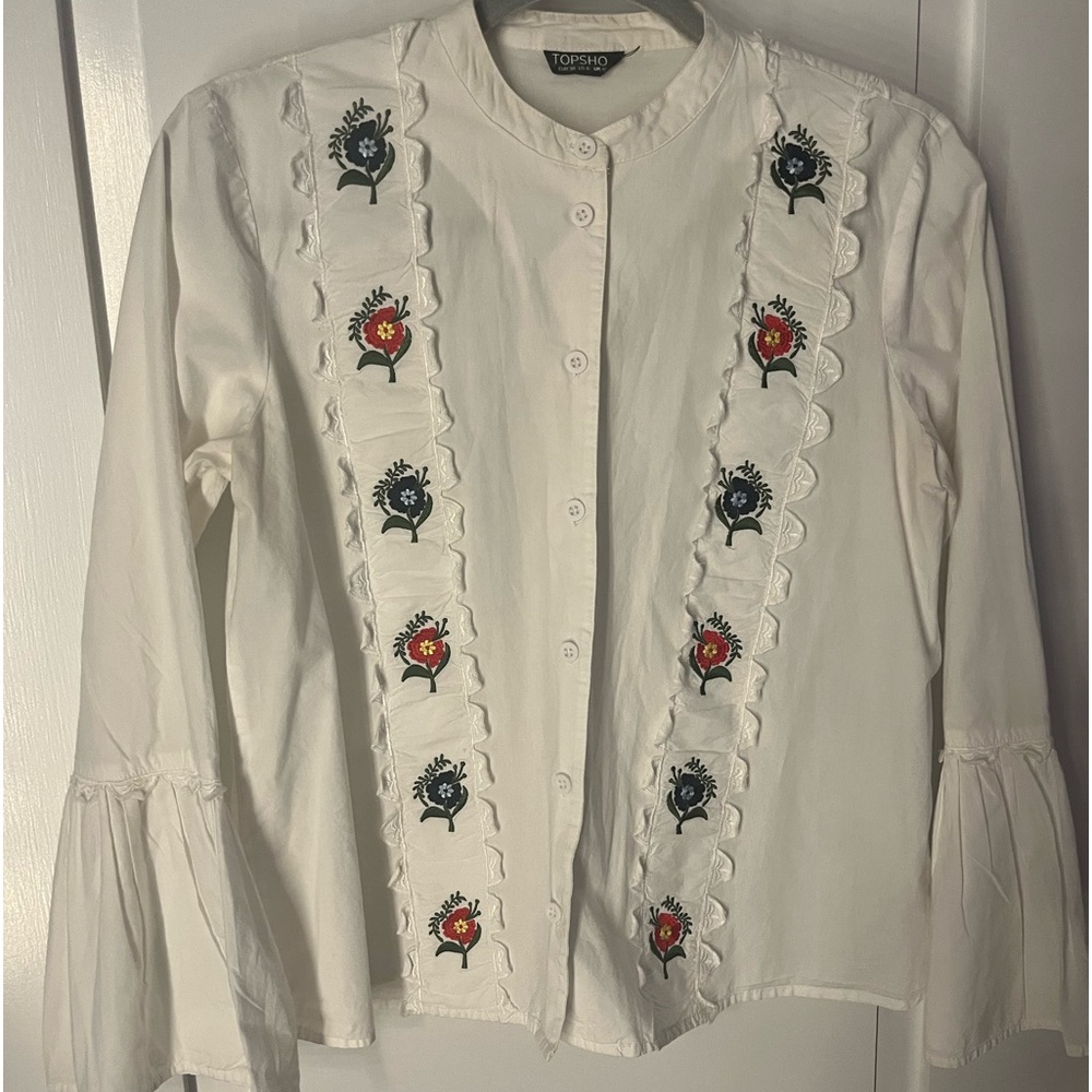 Topshop White Embroidered Ruffle Front Button-Up Blouse with flute sleeves